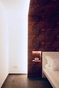 Postel nebo postele na pokoji v ubytování B&B Butterfly Suite