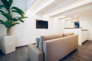 TV a/nebo společenská místnost v ubytování B&B Butterfly Suite