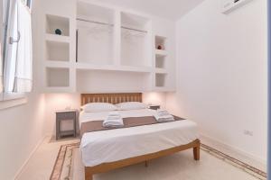Postel nebo postele na pokoji v ubytování Casa dei Nonni