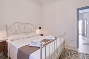 Postel nebo postele na pokoji v ubytování Casa dei Nonni