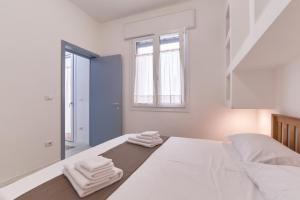 Postel nebo postele na pokoji v ubytování Casa dei Nonni