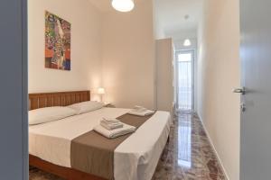 Postel nebo postele na pokoji v ubytování Casa dei Nonni