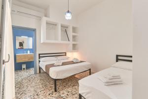 Postel nebo postele na pokoji v ubytování Casa dei Nonni