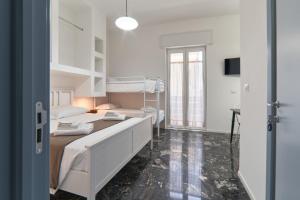 Postel nebo postele na pokoji v ubytování Casa dei Nonni