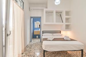 Postel nebo postele na pokoji v ubytování Casa dei Nonni