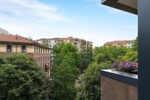 a view of a city from a balcony at Tolomeo in Milan