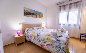 Posteľ alebo postele v izbe v ubytovaní MariCel Riumar Pura Natura
