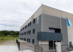a building with a black fence in front of it at ESTRELA DO CAMIÑO in Palas de Rei