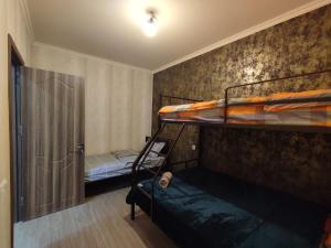 Letto o letti in una camera di Ananuri Cottages