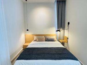 Cozy Ocean View APT in KK City Center客房内的一张或多张床位
