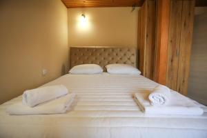 Una cama o camas en una habitación de Smestaj Paramun
