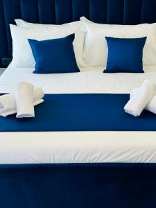 Postel nebo postele na pokoji v ubytování ILLYRIAN hotel Ksamil