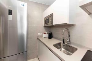 Kuchyňa alebo kuchynka v ubytovaní Apartamentos Recaredo 7 , 2ª planta
