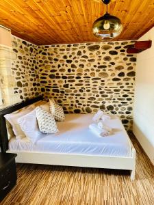 Postel nebo postele na pokoji v ubytování ILLYRIAN hotel Ksamil