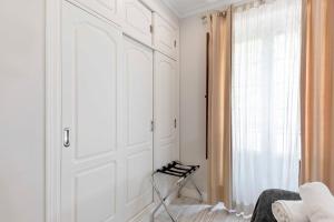 Posteľ alebo postele v izbe v ubytovaní Apartamentos Recaredo 7 , 2ª planta