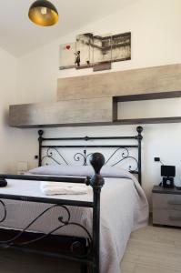 Postel nebo postele na pokoji v ubytování Is Seddas B&B