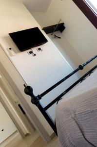 TV a/nebo společenská místnost v ubytování Is Seddas B&B