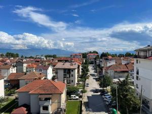 a view of a city with houses and cars at Hotel Majestic in Struga