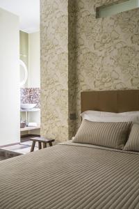 Posteľ alebo postele v izbe v ubytovaní Serendipity Rooms