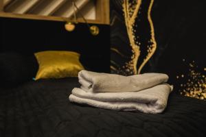 Posteľ alebo postele v izbe v ubytovaní Apartament 88
