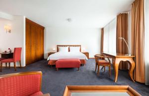 Cama ou camas em um quarto em Lindner Hotel Frankfurt Main Plaza, part of JdV by Hyatt