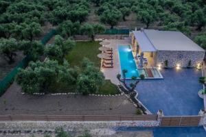 an aerial view of a house with a swimming pool at Villa Maria in Laganas