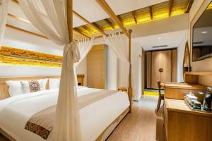 Yoba Boutique Hotel客房内的一张或多张床位