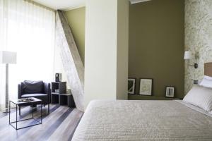 Postel nebo postele na pokoji v ubytování Serendipity Rooms
