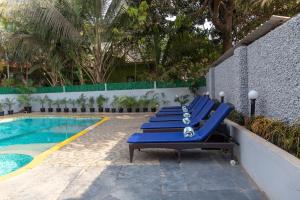 Bazén v ubytování Hotel Citrus Prime Candolm, Goa nebo v jeho okolí