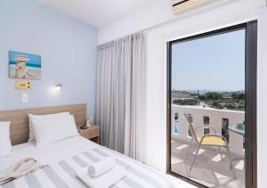 Postel nebo postele na pokoji v ubytování Myrtis Spa Hotel + 37 fotografií
