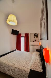 Voodi või voodid majutusasutuse I Due Magi by TraMonti Apartments toas