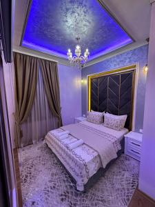 Voodi või voodid majutusasutuse Robevski luxury rooms toas