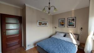 Posteľ alebo postele v izbe v ubytovaní apartament AWA Bajkowe Kołobrzeg