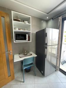 Köök või kööginurk majutusasutuses Seafront High Standard Apartment