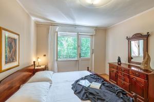 Łóżko lub łóżka w pokoju w obiekcie Holiday House Mlin