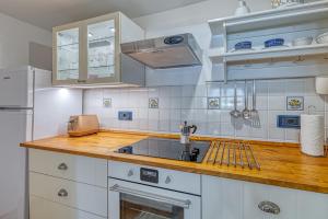 Kuchnia lub aneks kuchenny w obiekcie Holiday House Mlin