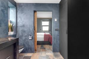 Una cama o camas en una habitación de Selfoss Modern Cabins