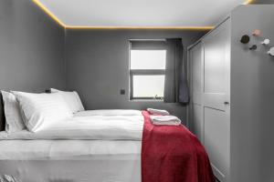 Una cama o camas en una habitación de Selfoss Modern Cabins