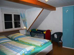En eller flere senger på et rom på Ferienhof Katzenmaier