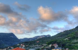 a mountain range with a sky background at Hotel Savoia in Finale Ligure