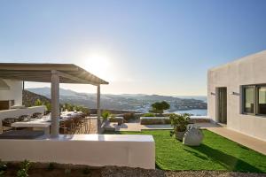 a house with a view of the ocean at Villa j-view in Psarou