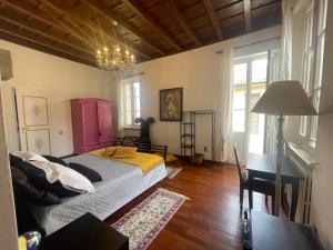Postel nebo postele na pokoji v ubytování Villa Ghiringhelli