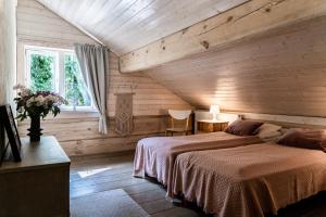 Postel nebo postele na pokoji v ubytování Meretuule Holiday Home + 25 fotografií