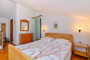 Postel nebo postele na pokoji v ubytování Apartments Marija
