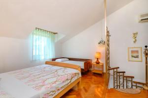 Postel nebo postele na pokoji v ubytování Apartments Marija