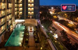 an overhead view of a building with a swimming pool at Best Western Premier The Hive in Jakarta