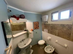 Ванная комната в SemiInterrato Giardino,BBQ,Mare