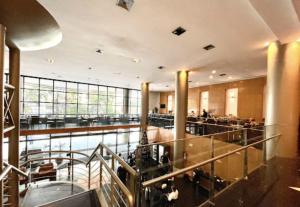 a large room with aasteryasteryasteryasteryasteryasteryasteryasteryasteryasteryastery at Savassi Tower Cobertura in Belo Horizonte
