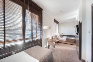 Postel nebo postele na pokoji v ubytování Hotel Różany Gaj - Destigo Hotels