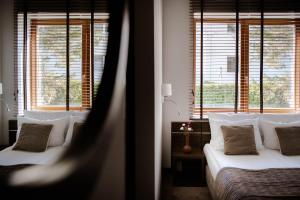 Postel nebo postele na pokoji v ubytování Hotel Różany Gaj - Destigo Hotels